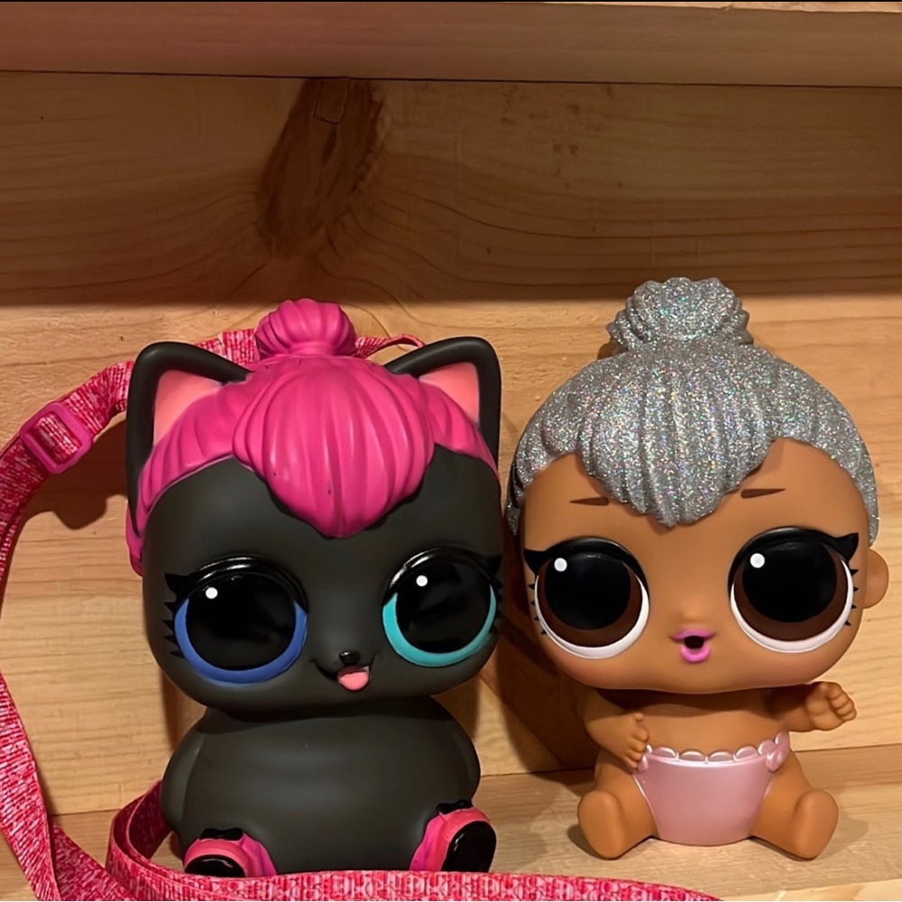 Lol doll and bank with a strap